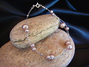 Bracelet c&acirc;ble rose