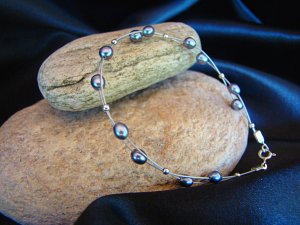 Bracelet c&acirc;ble violet
