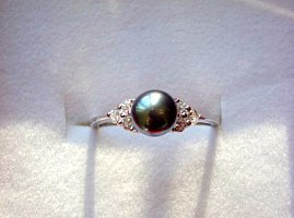 Bague  petite perle noire